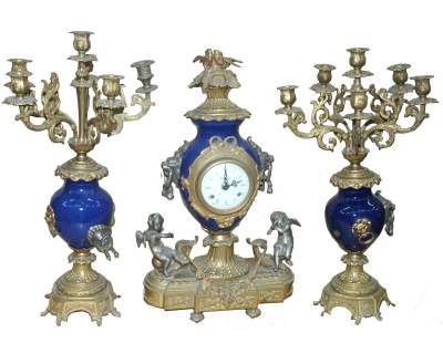 Trittico candelabri e orologio decorati a smalto